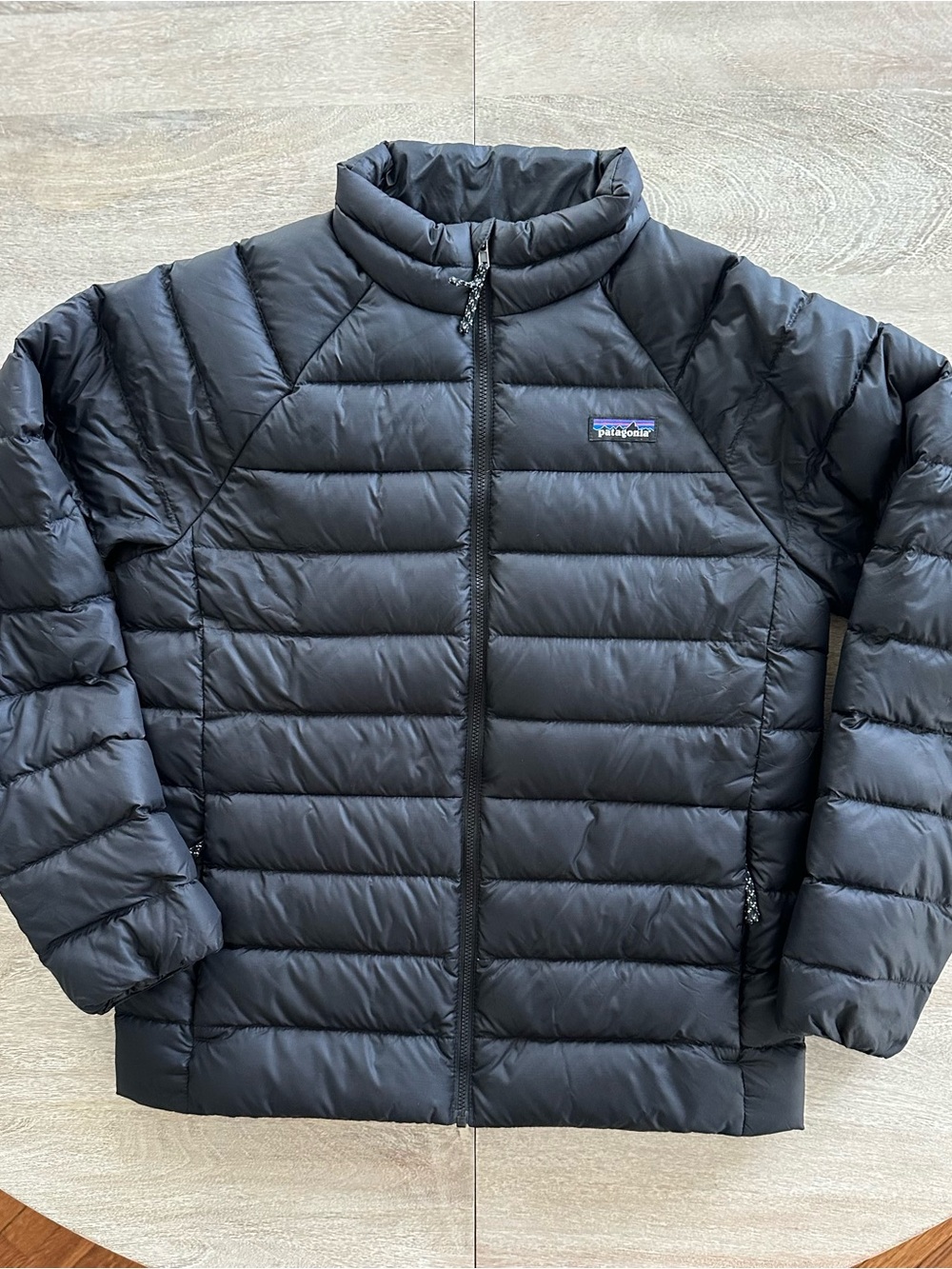 Patagonia Kids Down Black Sweater Jacket
Size Extra Large (14)